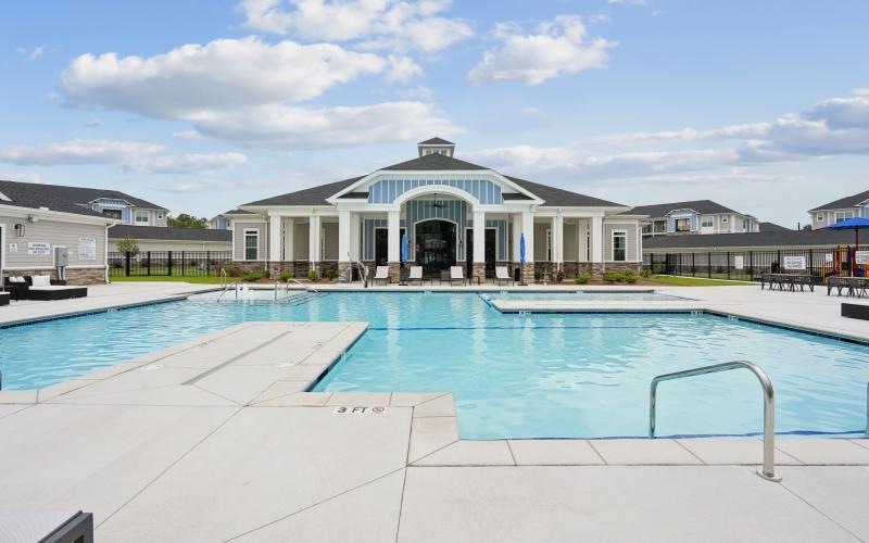a swimming pool outside clubhouse